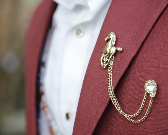 What's with the Bro-brooches?